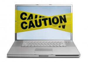 laptop-w-caution-tape